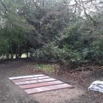 Paving slabs in place on the site for a new workshop next to the map