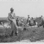 Old photograph showing Jan Tomasik supervising work on a building site in prewar Poland